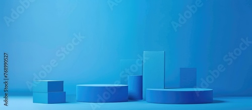 Blue podium boxes for showcasing products with a blue background