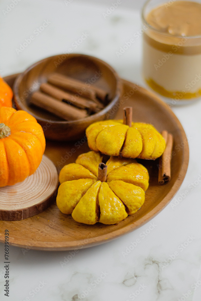 Pumpkin Latte on white background. Autumn concept. Pumpkin Latte on white background. Autumn concept.