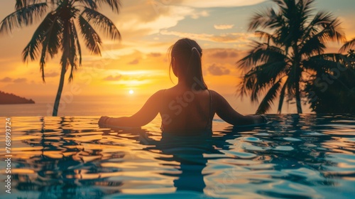 Serene young woman embracing sunset bliss at tropical resort pool  summer vacation relaxation