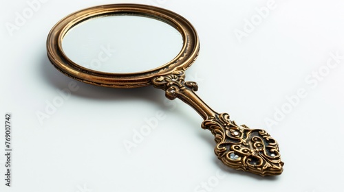 Vintage hand mirror isolated on white background