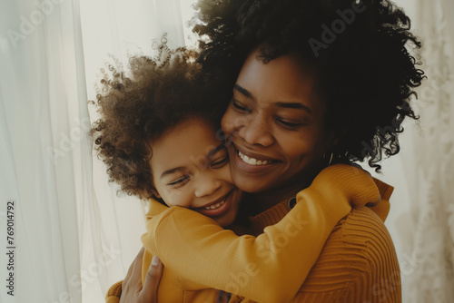 Photo of a happy smiling africanamerican woman hugging her kid, natural light and colors photo