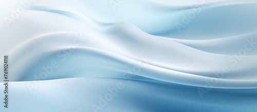 A close up of a serene blue and white background featuring a smooth wave pattern