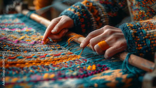 Hands weaving on a loom.