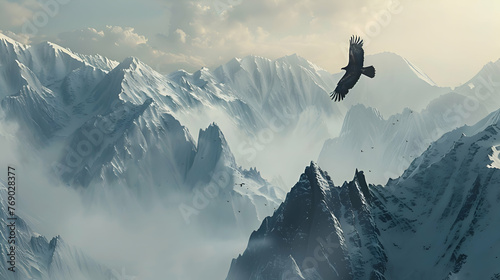 Eagle soaring high above rugged mountain peaks photo