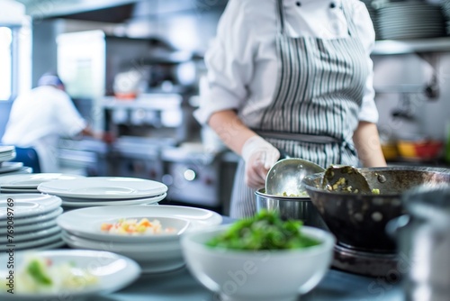 the gourmet dish being prepared in a high-end restaurant kitchen, the dish prepared in the restaurant, the chef preparing a dish in the kitchen closeup, the kitchen with food closeup, chef in kitchen © MH