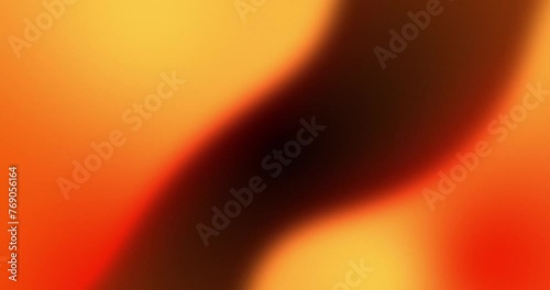Smooth and glowing wavy gradient background. Seamless looped orange color background.