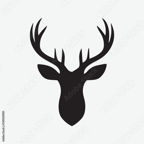 Black vector silhouette of a deer head with antlers isolated on a white background