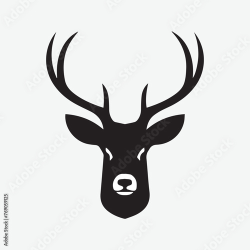 Black vector silhouette of a deer head with antlers isolated on a white background