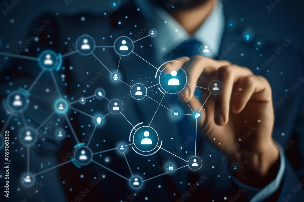 A man is drawing a network of people on a computer screen A man is drawing a network of people on a computer screen