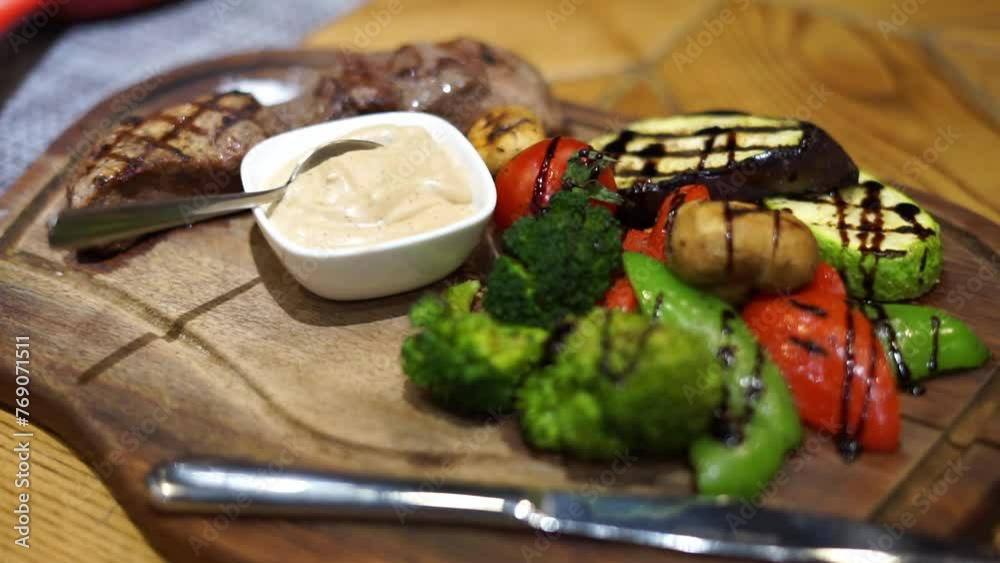 grilled steak and vegetables in a restaurant grilled steak and vegetables in a restaurant
