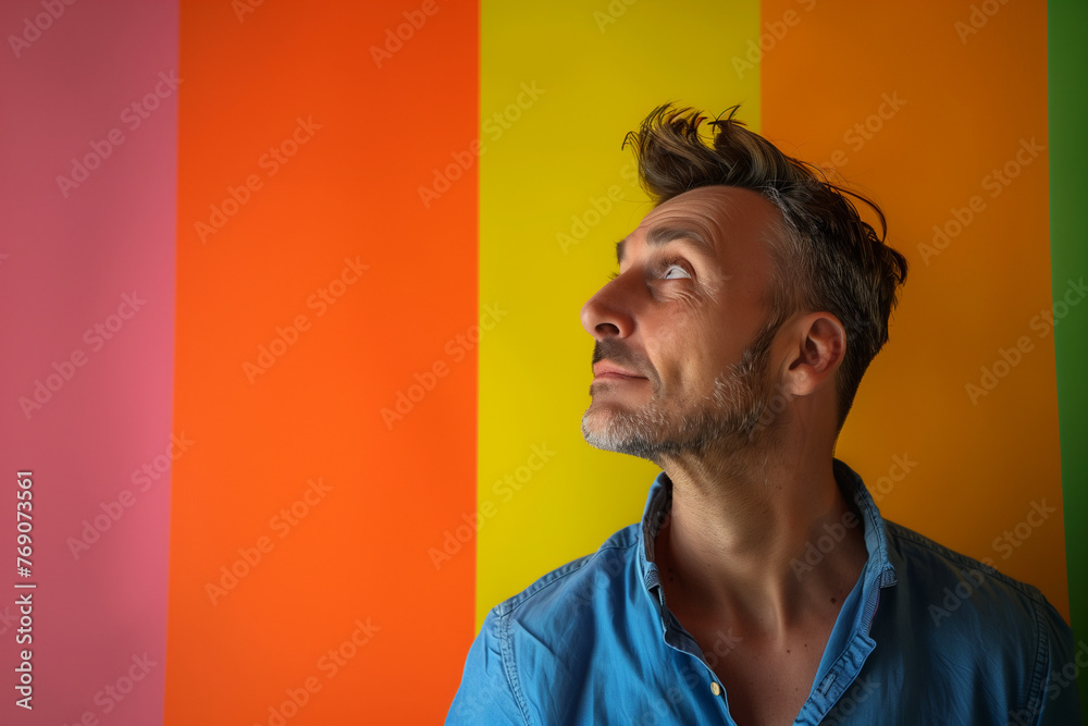 Φωτογραφία Queer man, handsome adult with gay pride on a background of lgbt colours in copy