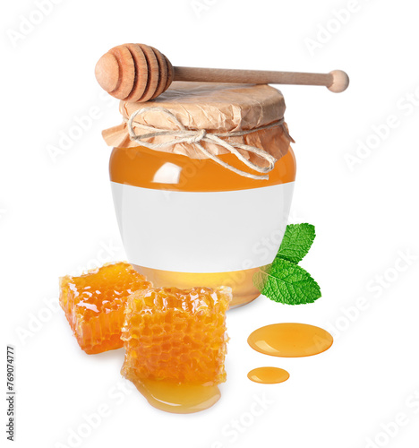 Sweet honey in glass jar with blank label, wooden honey dipper and pieces of honeycomb on white background. Mockup for design