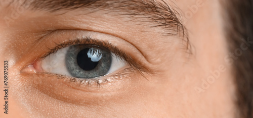 Young man with blue eyes, c...
