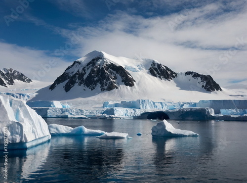 Antarctic landscape with glaciers and snow-covered ice floes at sea. Antarctica. The polar pole.