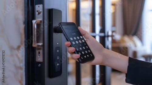 Closeup of a woman's finger entering password code on the smart phone and digital touch screen keypad entry door lock in front of a hotel room or apartment, Modern security, Smart device concept.