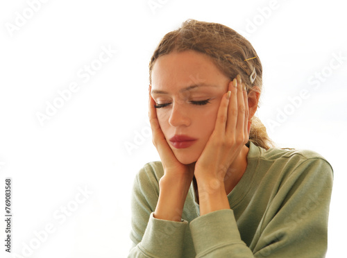Contemplative Moment,  blonde young Woman Deep in Thought on white background