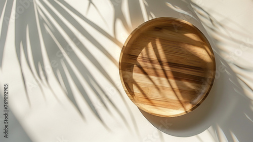 Palm tree leaf and wooden plate. Minimalism style illustration, top view, copy space. Natural organic concept, modern design