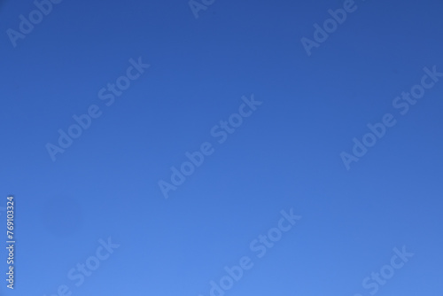 Clear blue sky to be used as a replacement background.