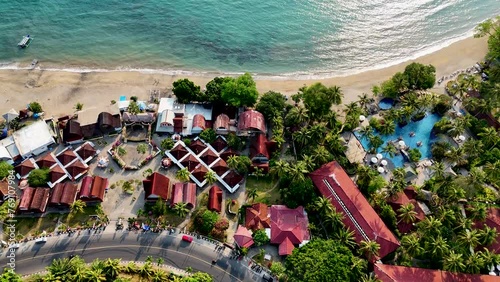 Lombok island, Indonesia. Aerial 4K footage of Senggigi resort coastline in West Nusa Tenggara, Indonesia. Resort island in east from Bali island. Drone video photo