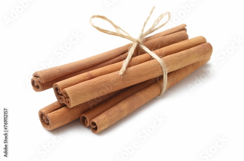 Tied cinnamon sticks isolated