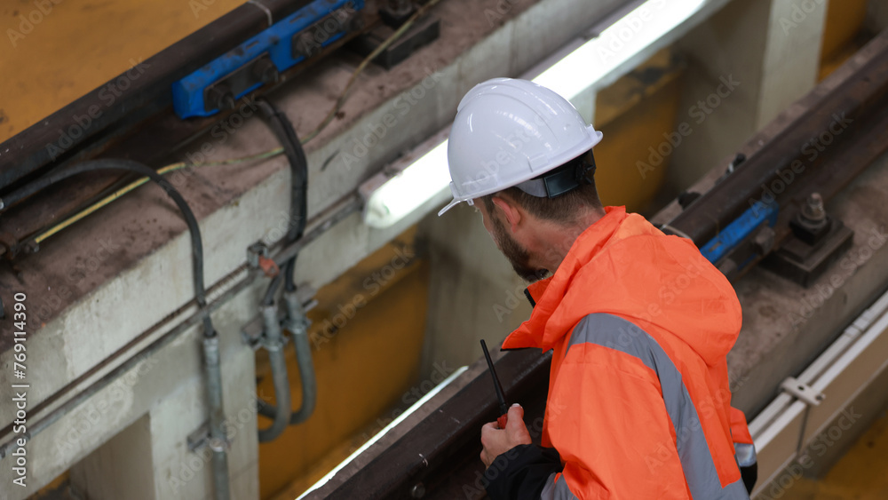 Observing the engineer working on the Electrical train tracks. Stock ...