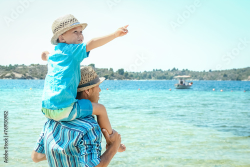 A Parent with children in nature in the park near the sea journey background