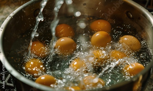 Eggs boiling in a pot of water, closeup view