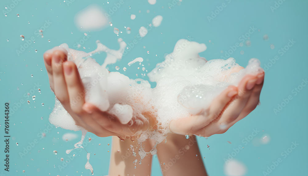 Hands in soap foam on light blue background Hands in soap foam on light blue background