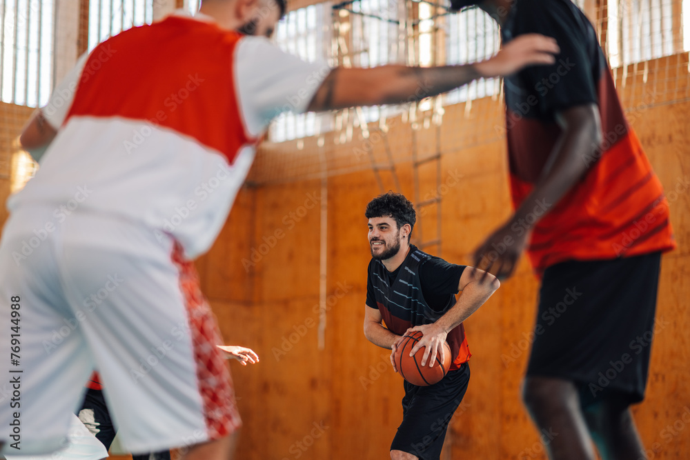 Basketball player on training with his interracial teammates.