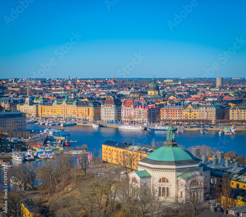 Eric Ericsonhallen in front of Ostermalm coastline. Stockholm old town next to Gamla stan. Aerial view of Sweden capital. Drone top panorama photo photo