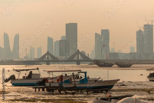 Boats and cityscpae view in the fisherman's bay in Manama Bahrain photo