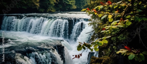 Several individuals are standing on a cascading waterfall in a serene natural setting  enjoying the picturesque view