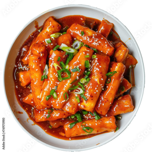 original traditional korean food tteokbokki with red sauce and celery as topping photo