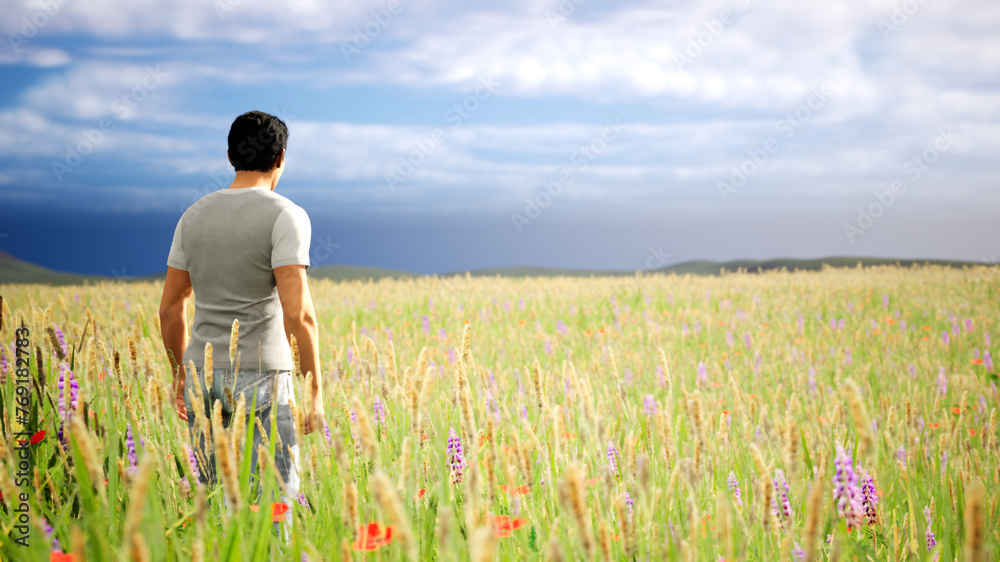 Man in focus in a field looking towards a stormy horizon