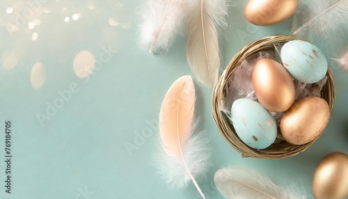 happy easter minimal banner easter eggs and feathers on turquoise pastel background flat lay copy space