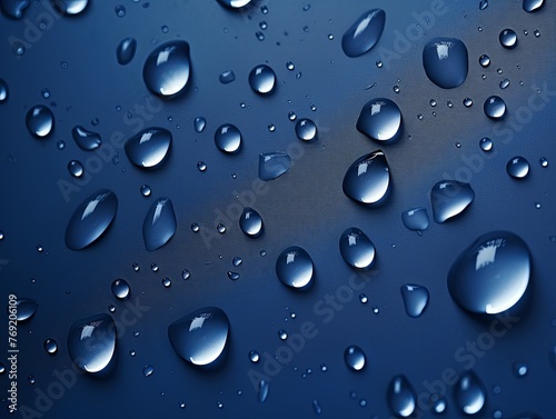 water droplets on all navy blue, matte background