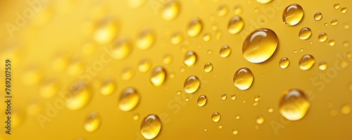 water droplets on all yellow, matte background