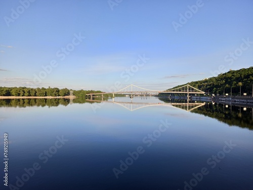 Dnieper river and view of the pedestrian bridge in Kyiv