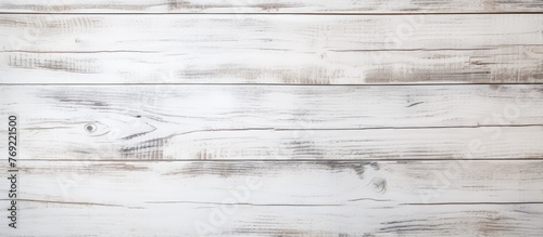 Close-up view of a white wood background displaying a rough surface texture, highlighting its intricacies and natural imperfections
