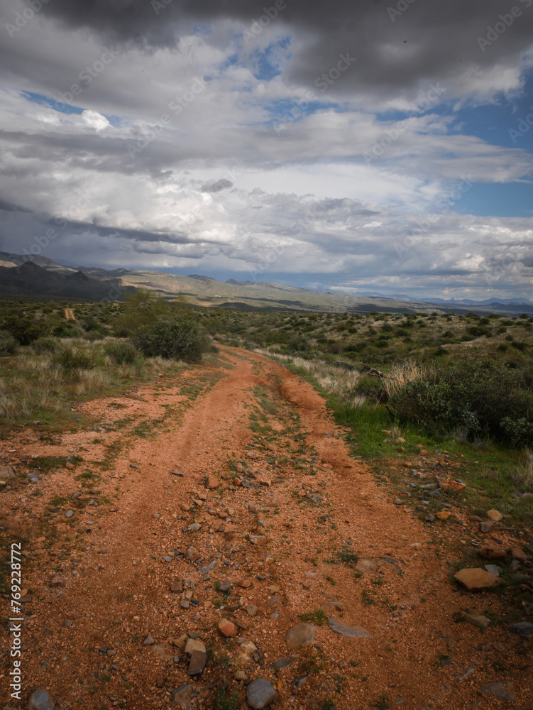 Four wheel drive road in Cave Creek Arizona desert in Tonto national Forest with stormy sky