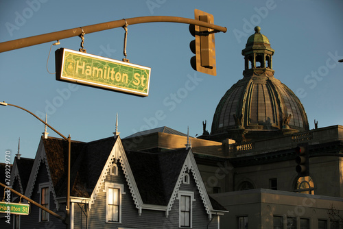 Sunset view of a historic Victorian home and Courthouse of downtown Redwood City, California. photo