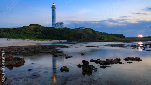 Evening landscape of a coral reef beach after sunset in late summer around the lighthouse of Green Island (Lyudao), an outlying island in southeastern Taiwan.