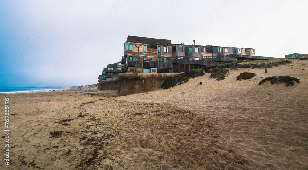 Condos and apartments on the beach. Modern beach-front complex just steps from the ocean, CA