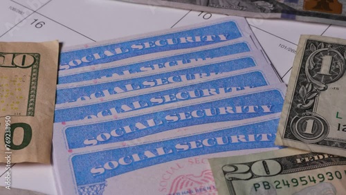 11 close up social security cards ssn cash US dollar bills money photo