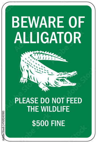 Alligator warning sign beware of alligator. Please do not feed the wildlife