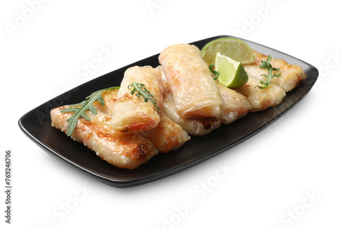 Tasty fried spring rolls, arugula and lime isolated on white