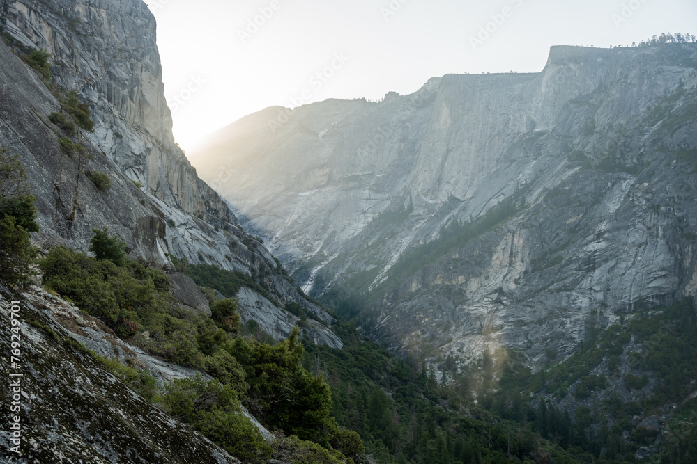 Light Rays Shine Into The Valley Below Snow Creek Falls In Yosemite