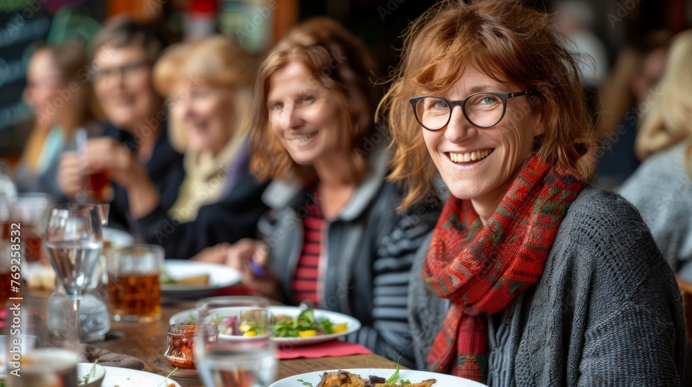 Senior friends dining in nursing home, focus on happy woman, blurred background with text space