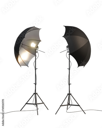 Studio lighting equipment. Flash and umbrella. Camera flash head mounted on stand with umbrella light reflector in photography studio