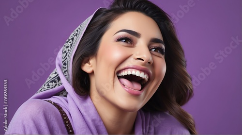 young middle eastern middle aged woman on plain bright purple background laughing hysterically looking at camera background banner template ad marketing concept from Generative AI
